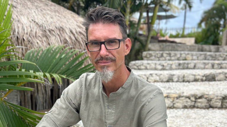 Madhava looking into camera